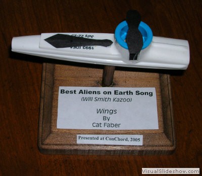 Aliens on Earth (Will Smith Kazoo)<br/>Wings, by Cat Faber<br/>ConChord 19 - 2005